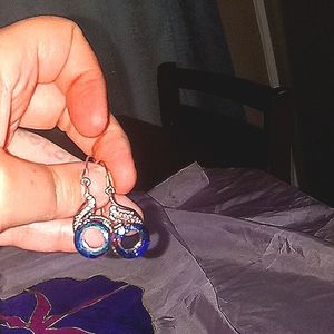 Pair of stainless steel fashion earrings dangling style,necklace coming soon!!!!